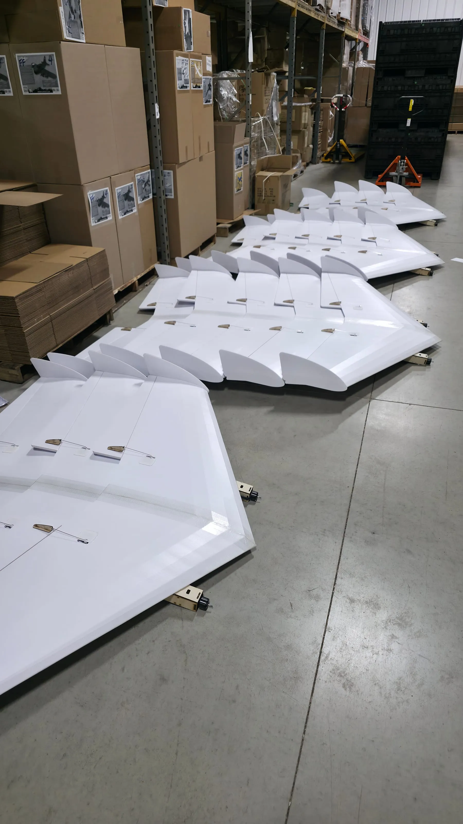 Purpose-built fixed-wing airframes staged during production.